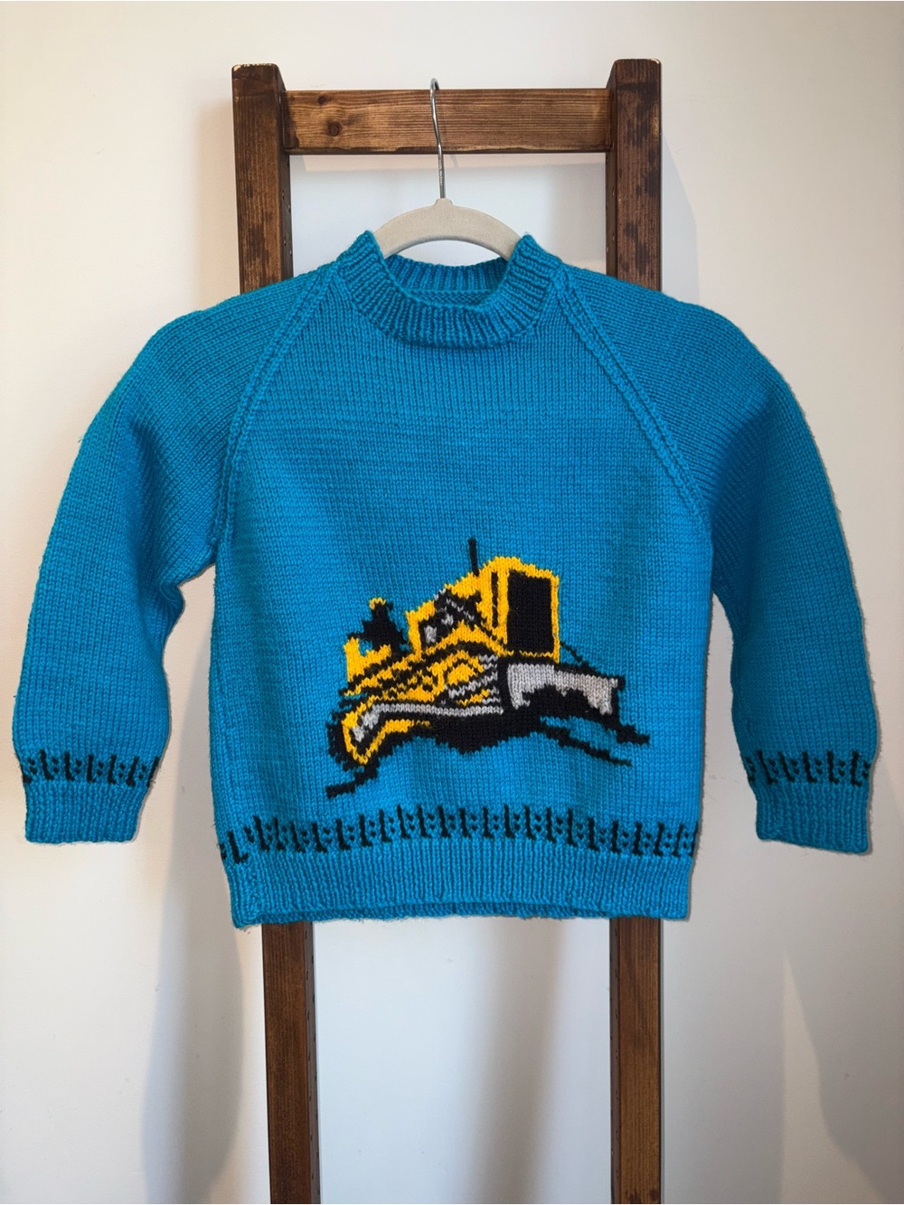 Bright Blue Crewneck Sweater with Yellow Bulldozer Motif